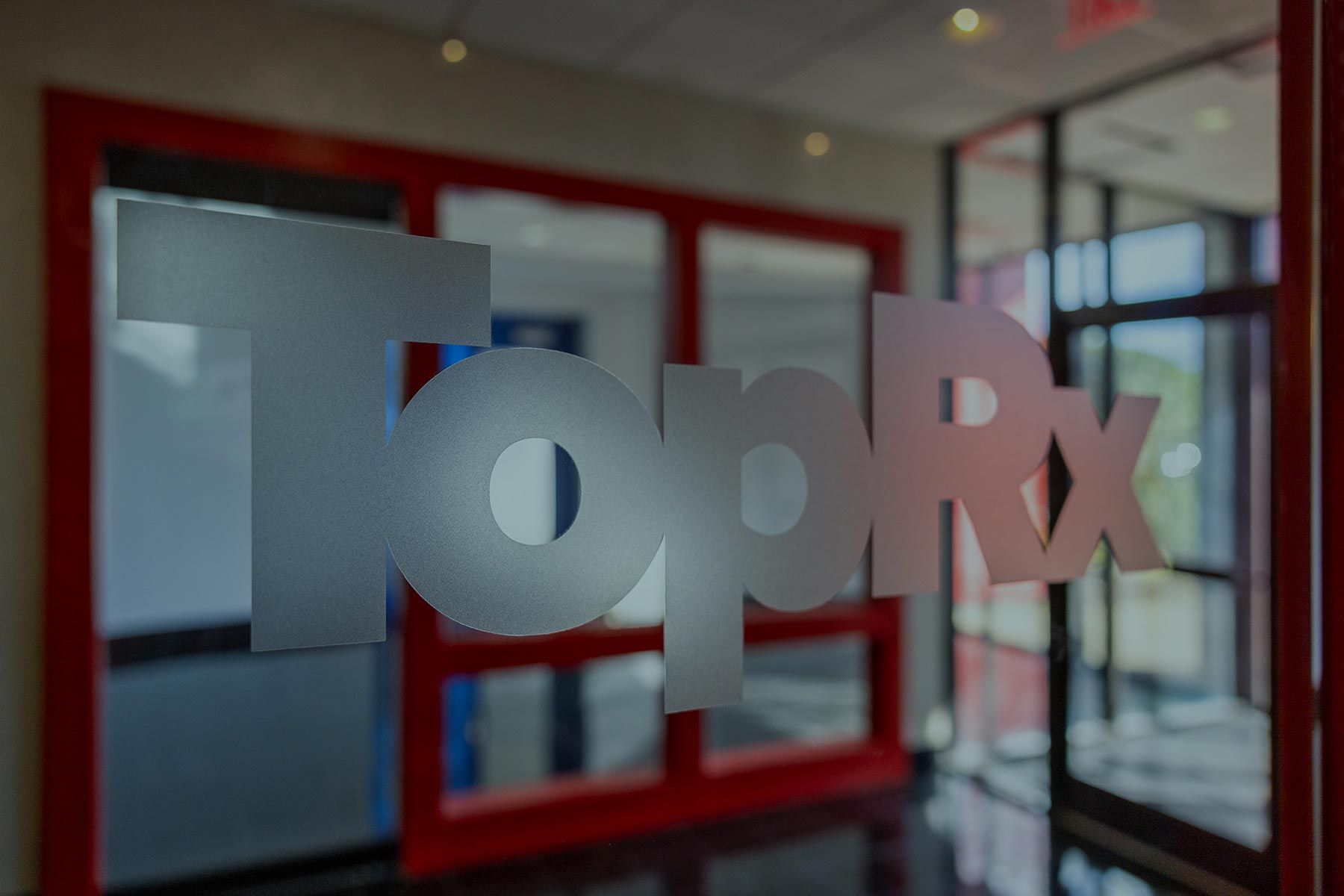 TopRx logo on office door